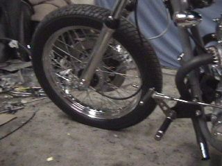 Original frt. wheel.  6k on the bike chrome wasnt bad at all!
