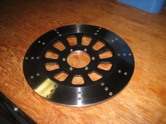 Click to view full size image
 ============== 
Drilled 30 holes in front disk rotor
