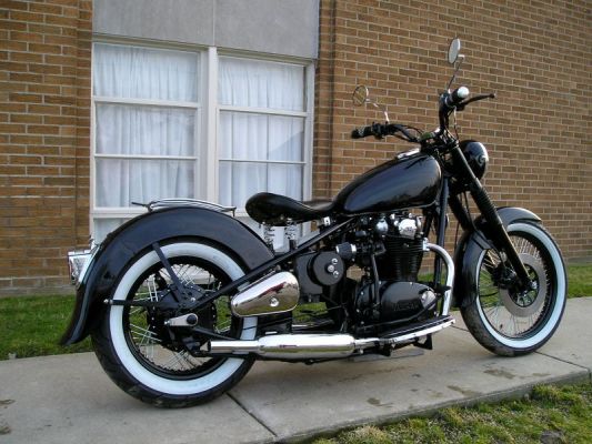 Click to view full size image
 ============== 
XS650 Custom
Tool box and flared fenders add confusion.

