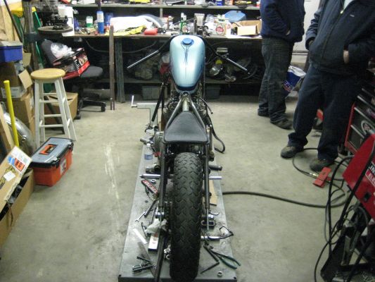 Click to view full size image
 ============== 
My bobber project, after just figuring seat mount
just got the gusset for the frame/seat mount welded in place and installed the Rich Philips leather solo springer seat
