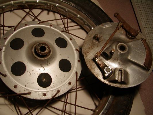 Click to view full size image
 ============== 
Outside of hub
This is what the hub I'm offering looks like on the outside. Note the paint on the rotor side. Also, look at where the brake cable attaches to the hub on the right. It was welded. (This rim is the one I want to keep)
