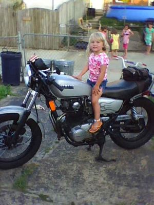 Click to view full size image
 ============== 
My youngest on my 82 Heritage Special.. my daily rider.
