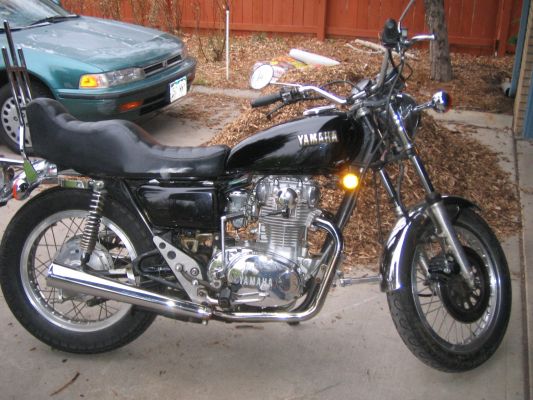 Click to view full size image
 ============== 
This is what it looks like now
Not too bad if you ask me, this was after cleaning carbs, adding pods and re-jetting, new front fender (old one was dented from previous owner), repainted gas tank with new emblems, new blinkers, new tires, new battery, replaced fuel lines, new handlebars, new clutch and throttle cable, new (used from ebay) side covers, new sparkplugs,  fresh oil and filters and a few other odds and ends.
